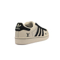 Adidas Superstar sneaker featuring Louis Vuitton branding on the side stripe Woman AD8008 - 2