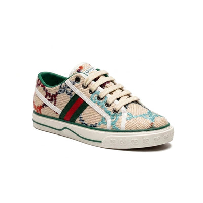 Gucci women's sneakers featuring a multicolored embroidered GG pattern, accented with the green and red Web stripe and green leather trim Beige G2949.