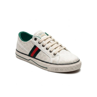 Gucci women's sneakers crafted from white jacquard fabric featuring a small GG pattern and the signature green and red Web stripe CC887.