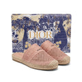 Christian Dior Woman in a colorway Featuring an embroidered 