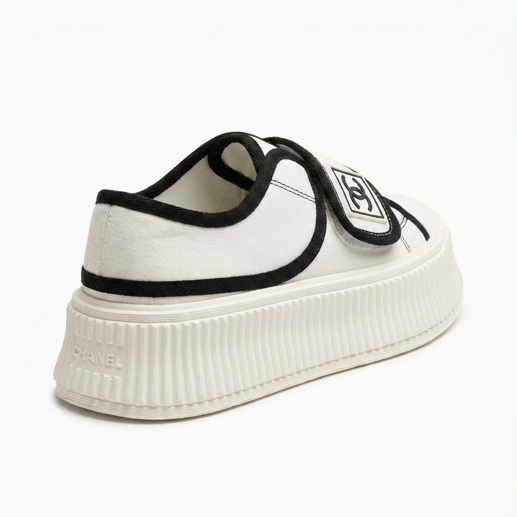 Chanel white Woman canvas platform sneaker with a black trim and a Velcro strap featuring a CC logo, styles luxury brands K0734. - 2