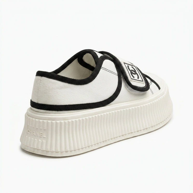 Chanel white Woman canvas platform sneaker with a black trim and a Velcro strap featuring a CC logo, styles luxury brands K0734. - 2