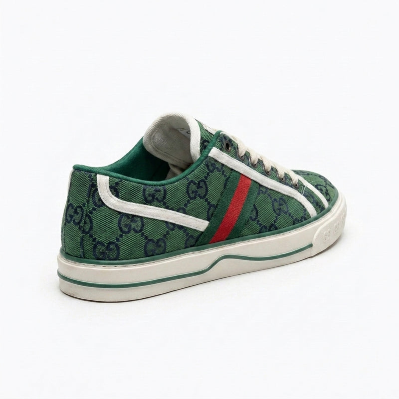 Gucci Woman sneaker Green featuring the signature GG monogram canvas and red-and-green web Gi2845. - 2