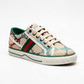 Gucci women's sneakers featuring a multicolored embroidered GG pattern, accented with the green and red Web stripe and green leather trim Beige G2949. - 1