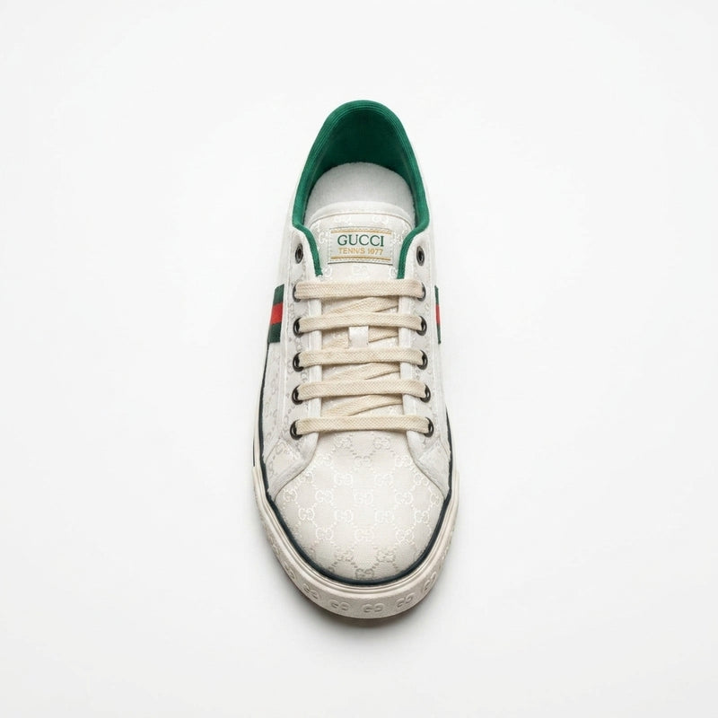 Gucci women's sneakers crafted from white jacquard fabric featuring a small GG pattern and the signature green and red Web stripe CC887. - 3