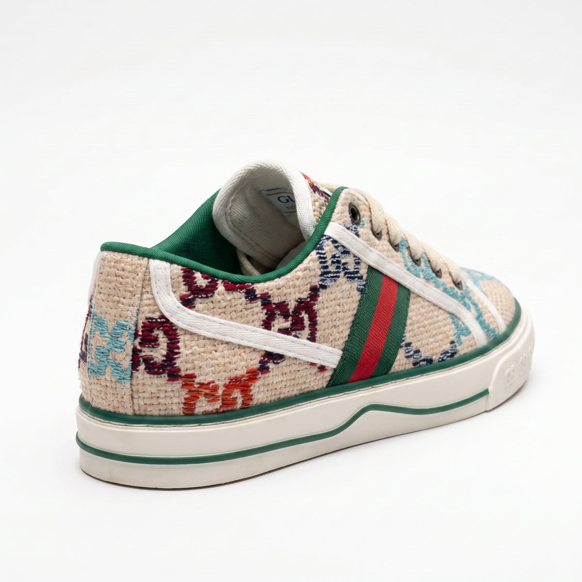 Gucci women's sneakers featuring a multicolored embroidered GG pattern, accented with the green and red Web stripe and green leather trim Beige G2949. - 2