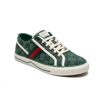 Gucci Woman sneaker Green featuring the signature GG monogram canvas and red-and-green web Gi2845.