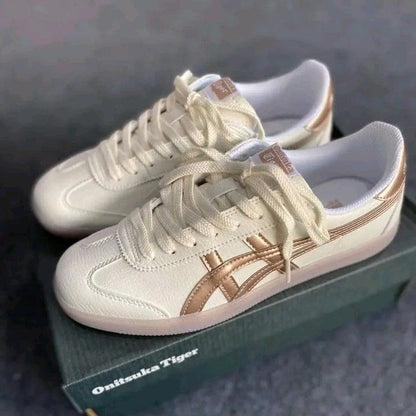 حذاء رياضي Onitsuka Tiger Asics للنساء 1183C095 باللون البيج والذهبي